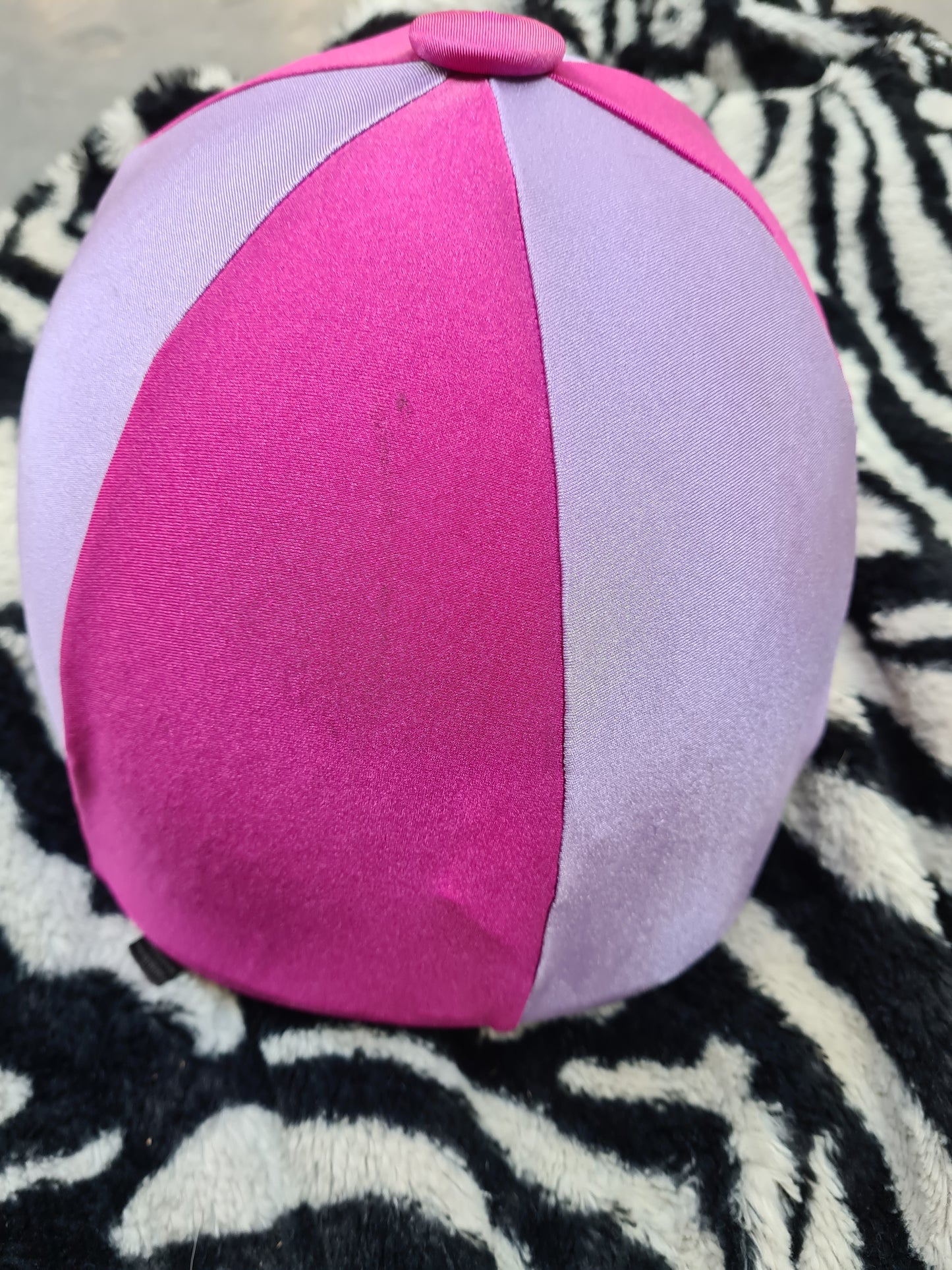 Used pink and purple hat silk cover