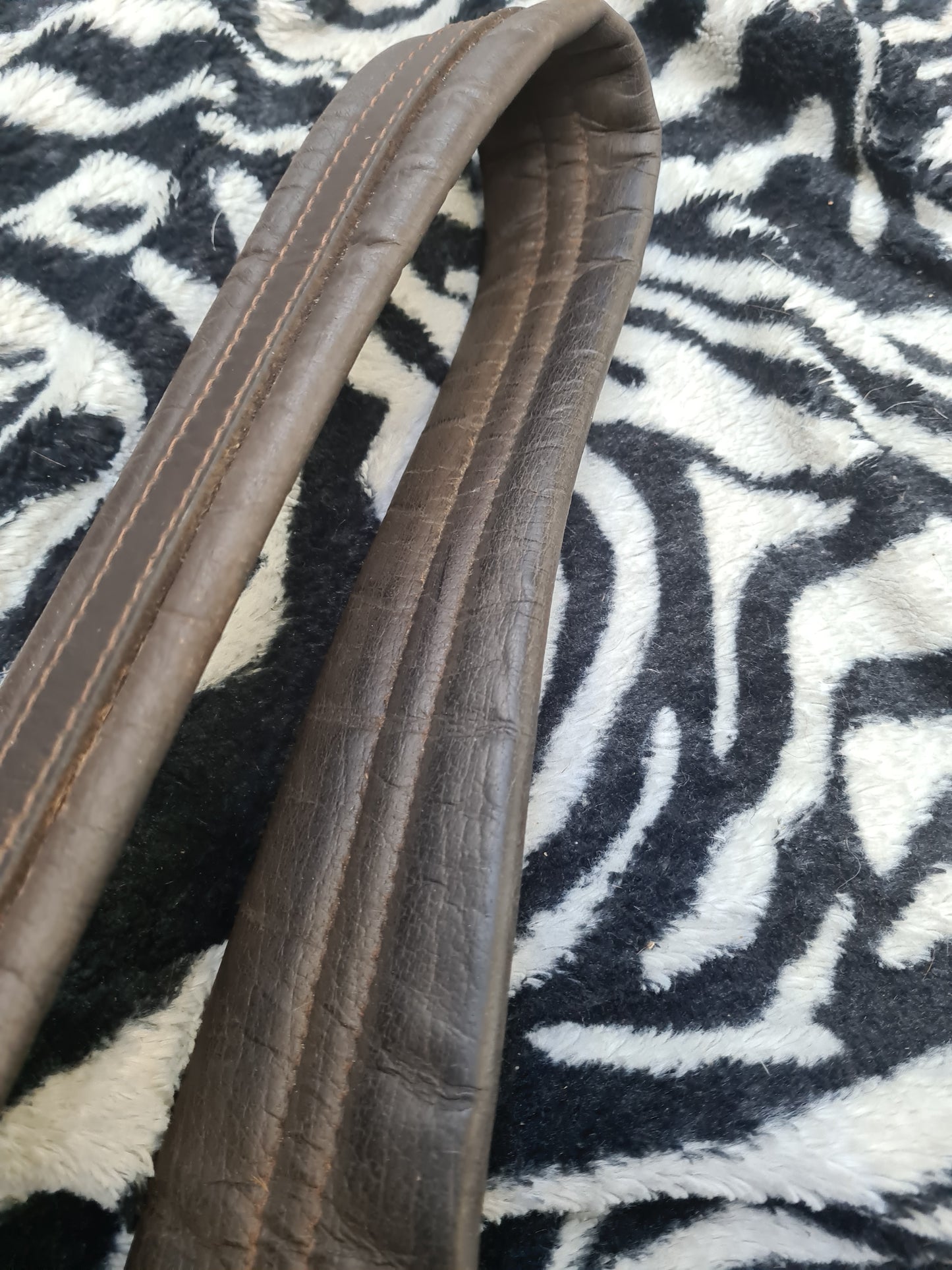 Used 52" brown leather girth