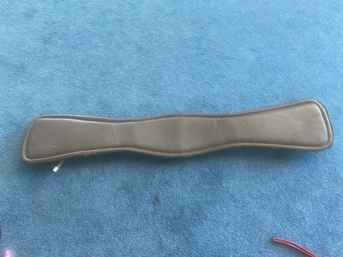 Brown leather girth 22” with removable padding