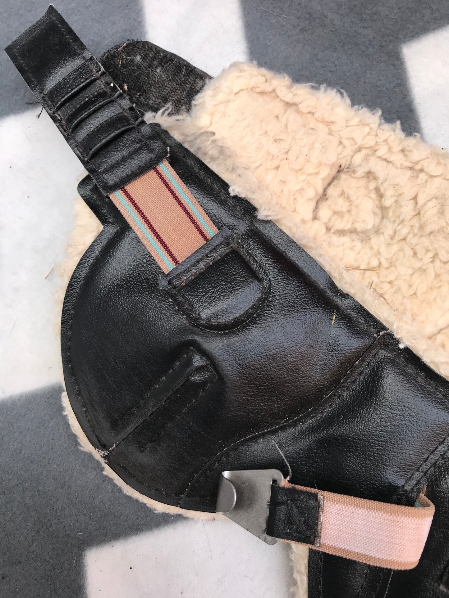 Black sheepskin lined cob size fetlock boots