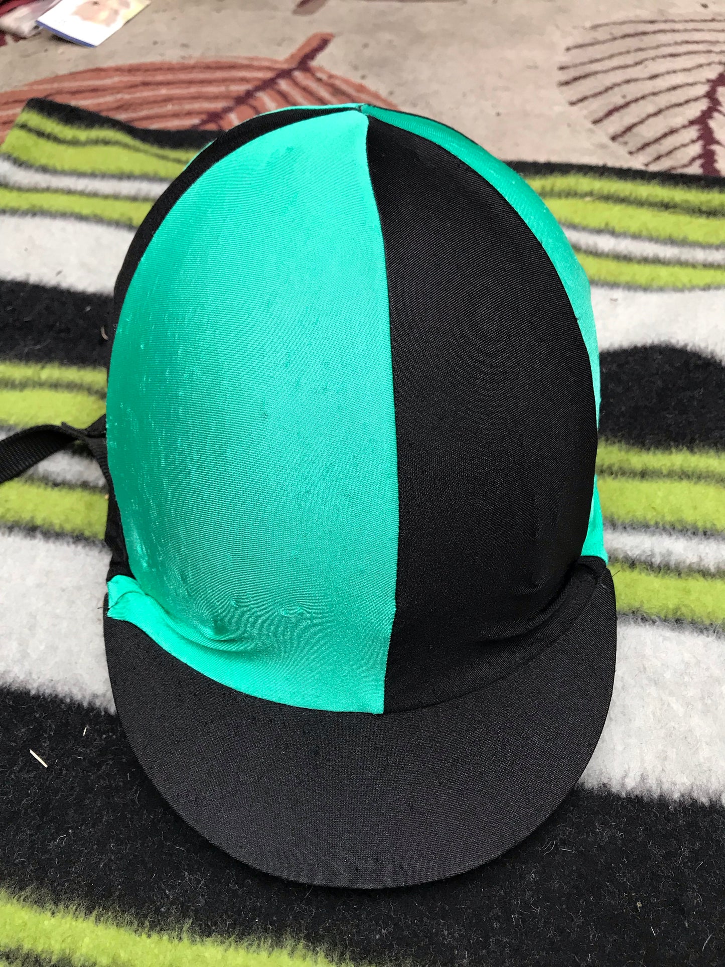 green and black hat silk