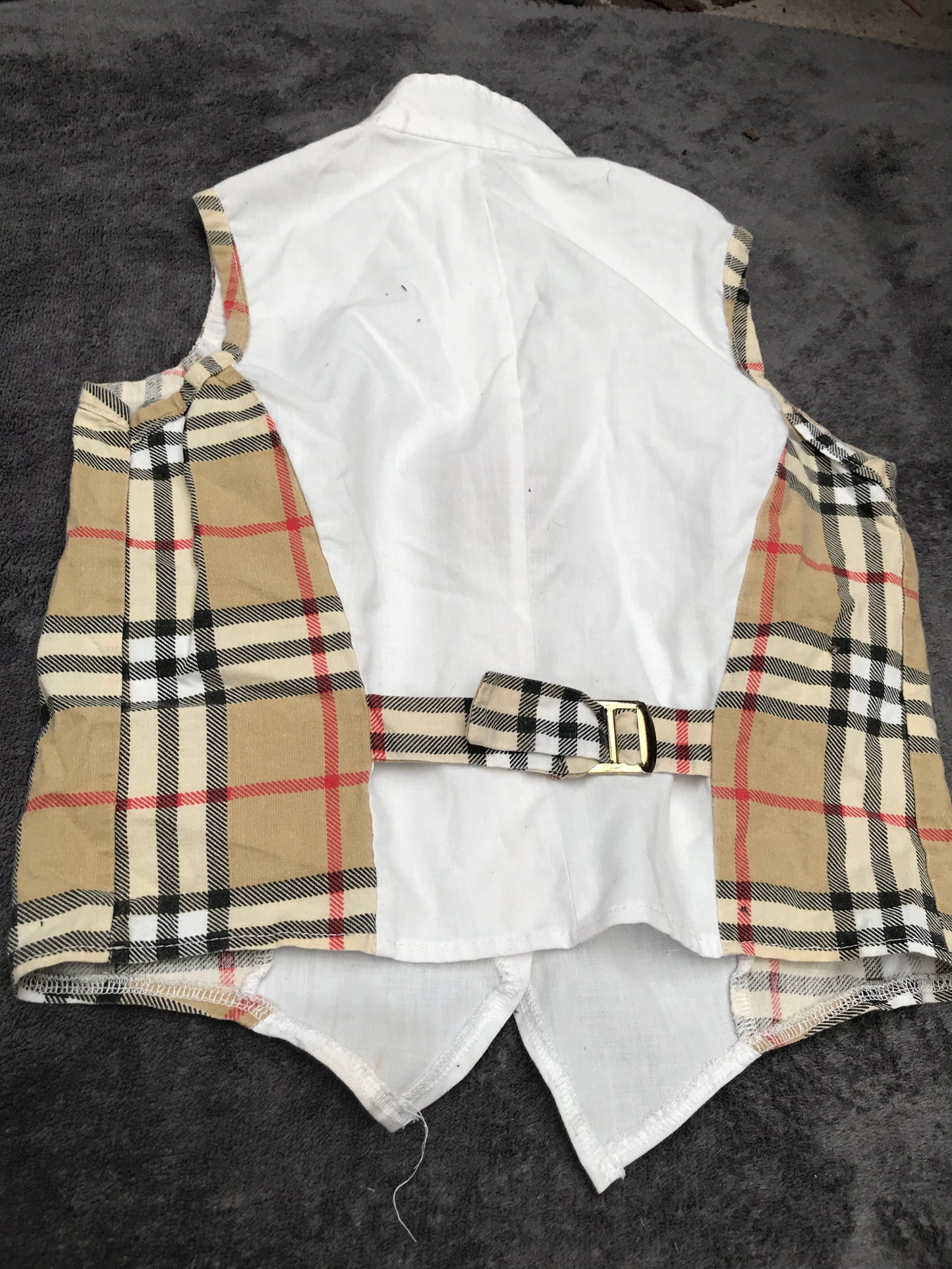 Sleeveless beige checked shirt size: 28”chest - approximately 4-5 years