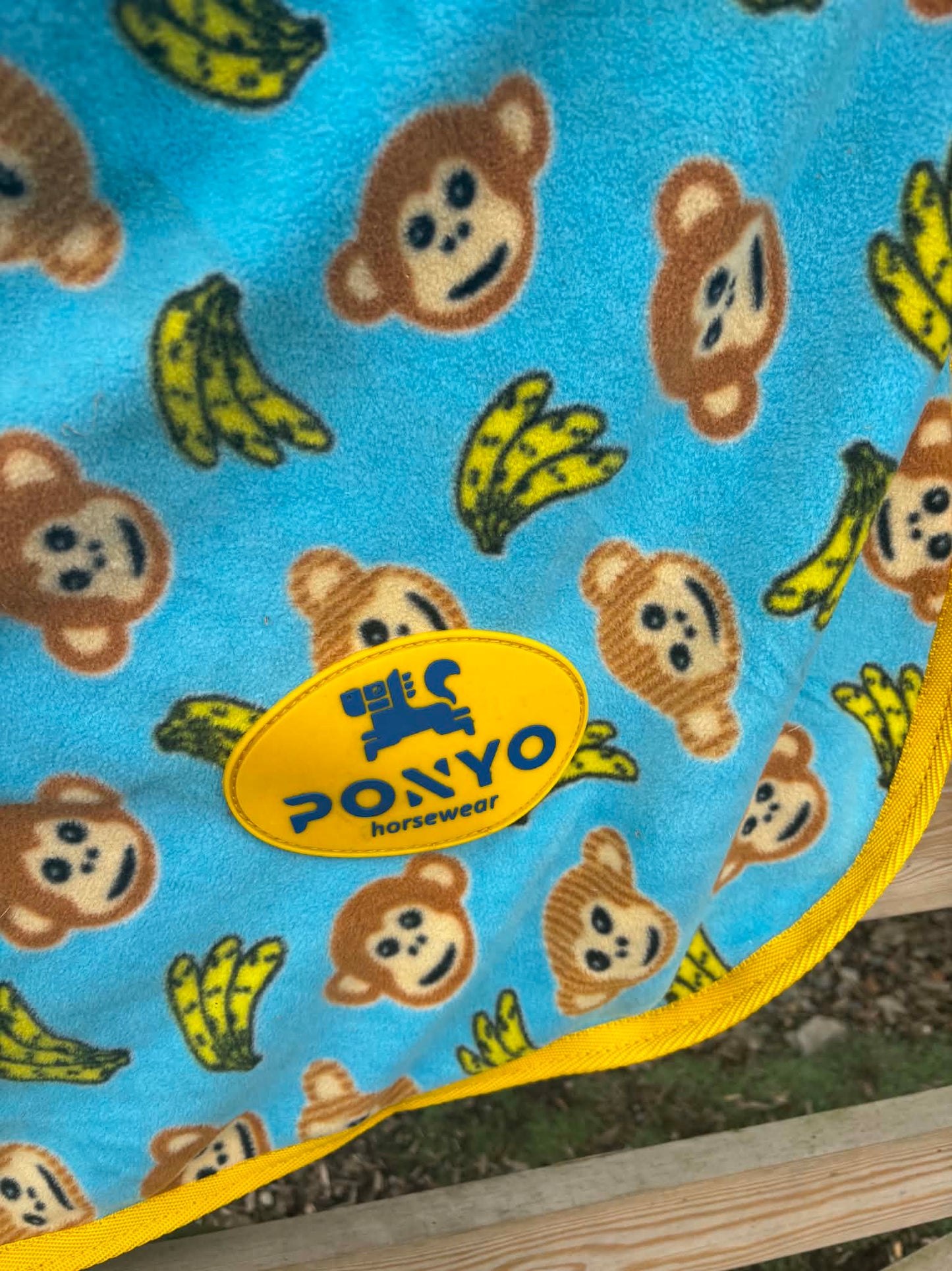 Ponyo blue and yellow monkey and banana fleece rug with detachable neck