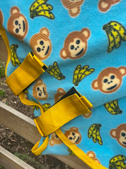 Ponyo blue and yellow monkey and banana fleece rug with detachable neck