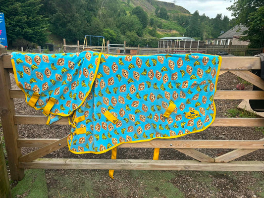 Ponyo blue and yellow monkey and banana fleece rug with detachable neck
