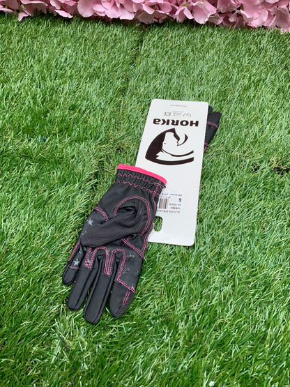 New children’s Horka black and pink riding gloves in size 6