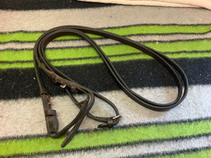 51” brown leather reins.