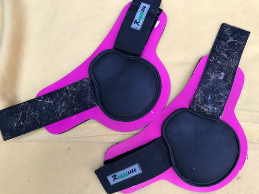 Requisite pink and black fetlock boots size large